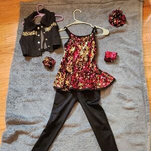 Dance costume, one piece pant, w/ jacket. Spandex, sequence, hair& handpieces.